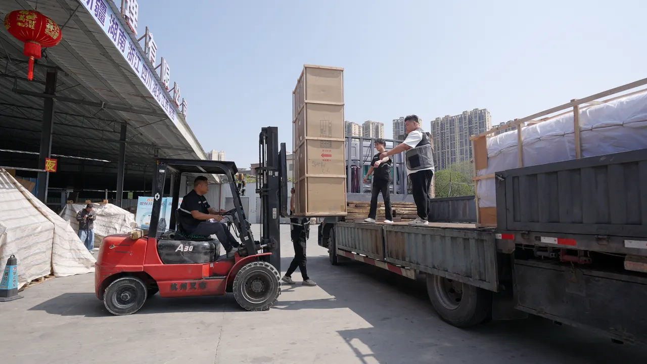 Forklift loading material at a logistics site